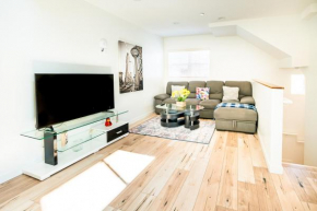Unique 3-Level Loft with One bedroom & Two Full Bathroom